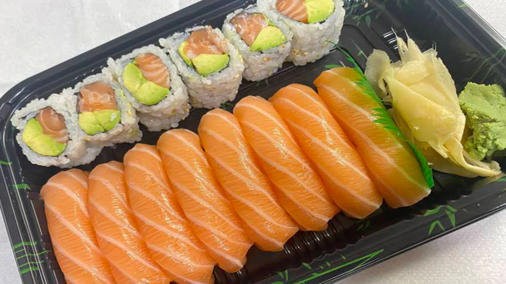 Salmon nigiri and salmon avocado roll combo at Musashi & Mizu Sushi, an Asian Fusion Restaurant in Brooklyn