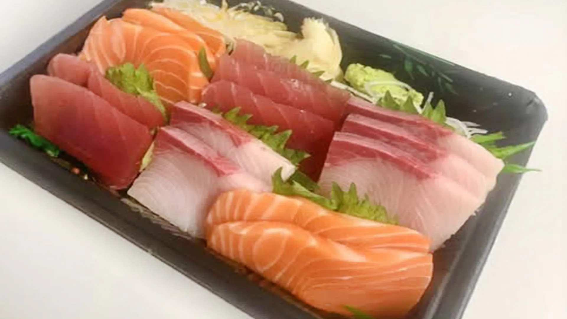 Assorted sushi platter with nigiri and California rolls at Musashi & Mizu Sushi, an Asian Fusion Restaurant in Brooklyn