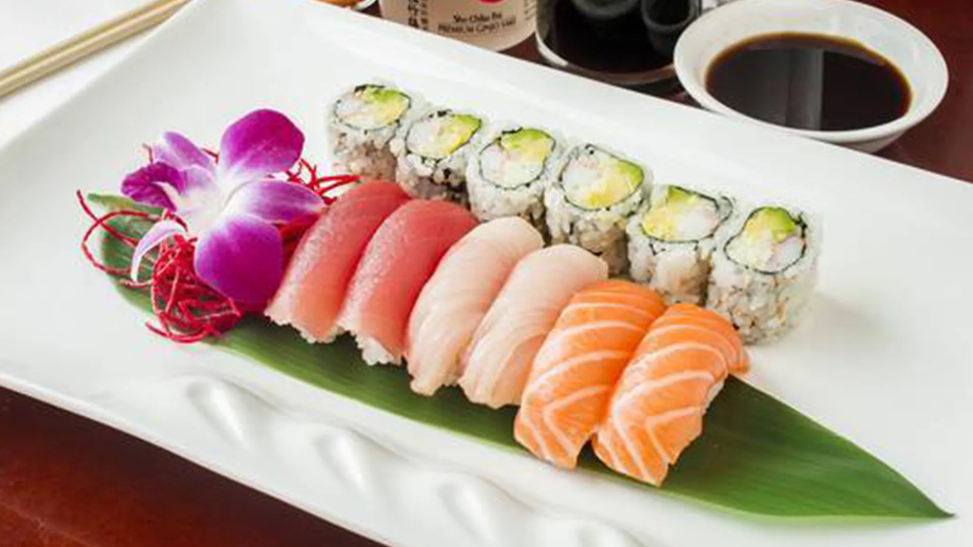 Colorful sushi rolls with tobiko toppings at Musashi & Mizu Sushi, an Asian Fusion Restaurant in Brooklyn